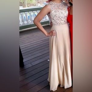 Beige long gown. Can be used for prom or desi functions.